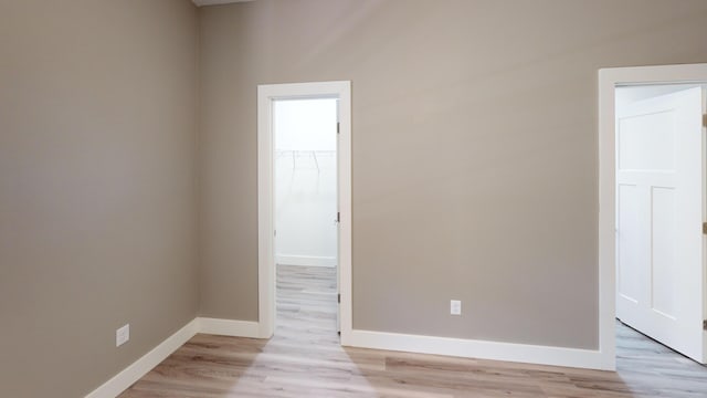 500 Timber Wolf Rd, Hollister, MO 65672 - unfurnished room with light wood-type flooring and baseboards
