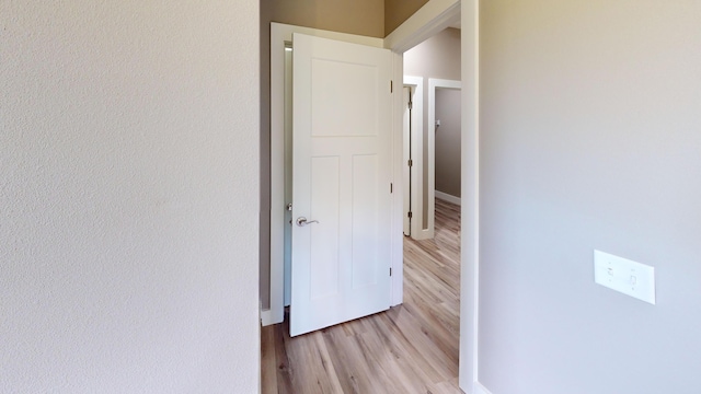 500 Timber Wolf Rd, Hollister, MO 65672 - corridor featuring baseboards and wood finished floors