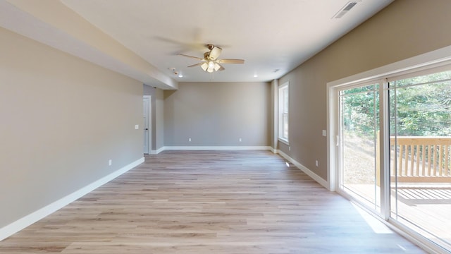 500 Timber Wolf Rd, Hollister, MO 65672 - spare room featuring a ceiling fan, visible vents, light wood-style flooring, and baseboards