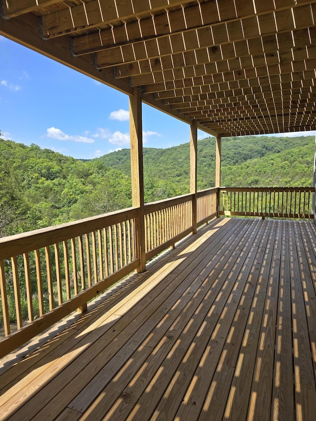 500 Timber Wolf Rd, Hollister, MO 65672 - wooden deck with a forest view