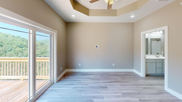 500 Timber Wolf Rd, Hollister, MO 65672 - unfurnished room featuring baseboards, recessed lighting, a ceiling fan, and light wood finished floors
