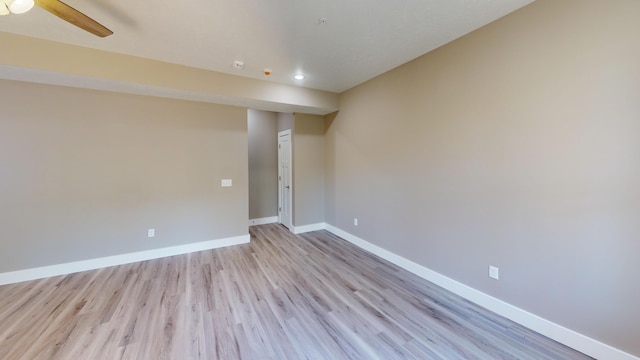 500 Timber Wolf Rd, Hollister, MO 65672 - empty room with baseboards, recessed lighting, ceiling fan, and light wood finished floors