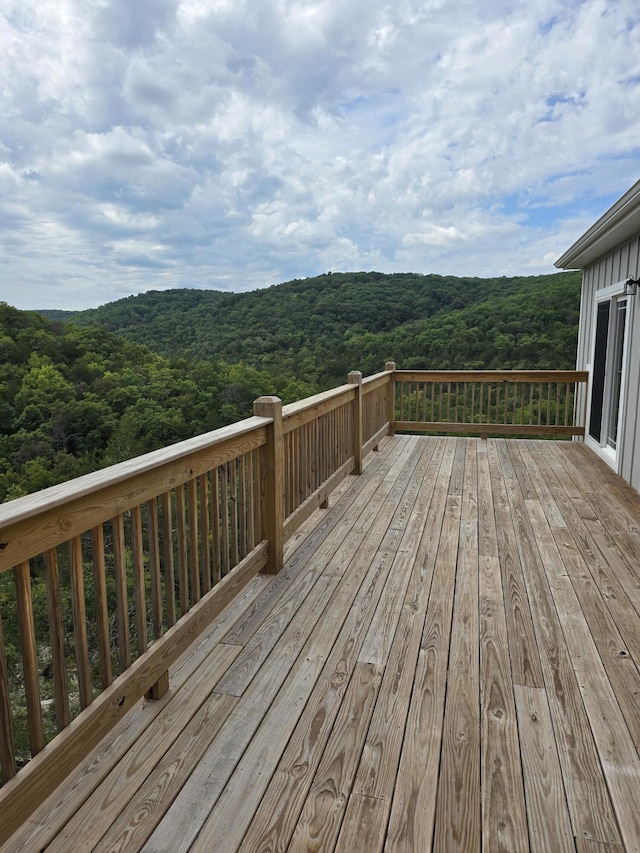 500 Timber Wolf Rd, Hollister, MO 65672 - wooden terrace with a wooded view
