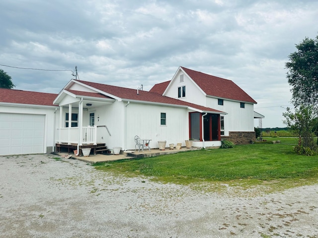 exterior space featuring a front yard and a garage