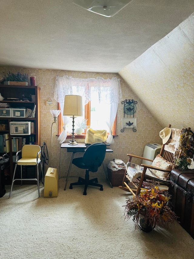 home office with a textured ceiling and vaulted ceiling