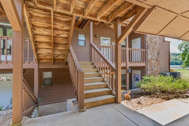 doorway to property featuring central AC