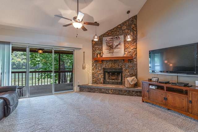 living room with a stone fireplace, high vaulted ceiling, carpet flooring, and ceiling fan