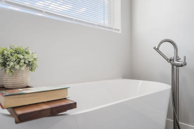 bathroom with a washtub