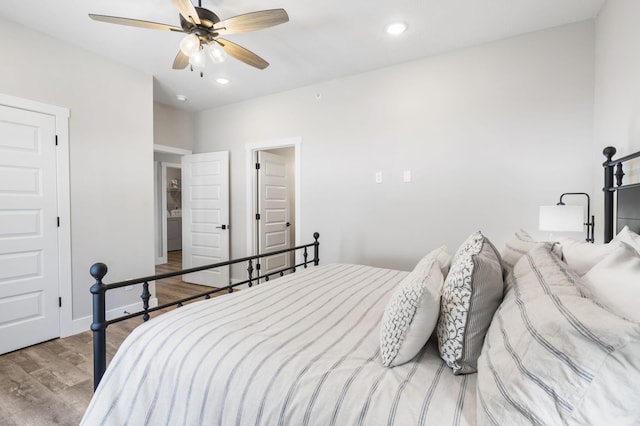 bedroom featuring ceiling fan and light wood-type flooring