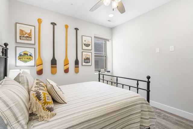 bedroom featuring ceiling fan and hardwood / wood-style floors