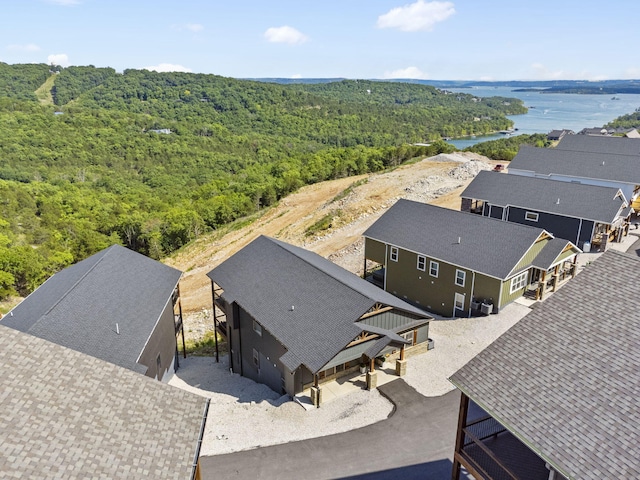 drone / aerial view with a water view