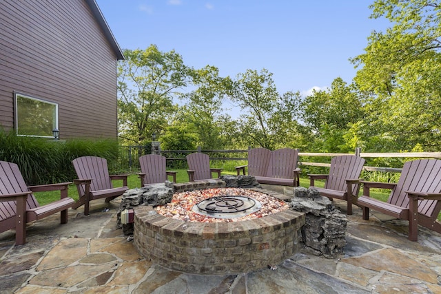 view of patio / terrace featuring a fire pit