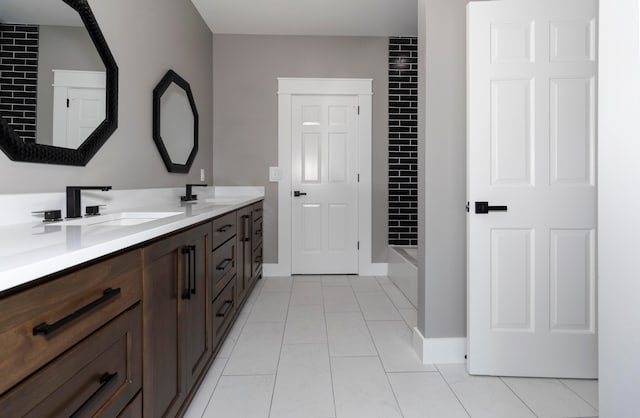 bathroom with vanity and separate shower and tub