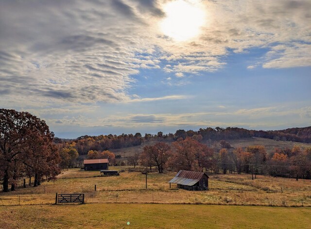 view of mountain feature with a rural view