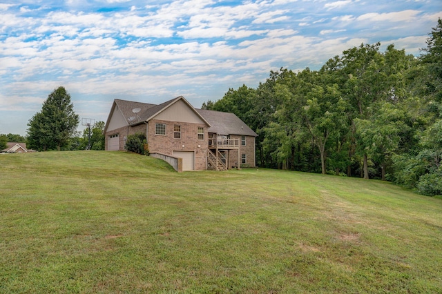 view of yard featuring a garage