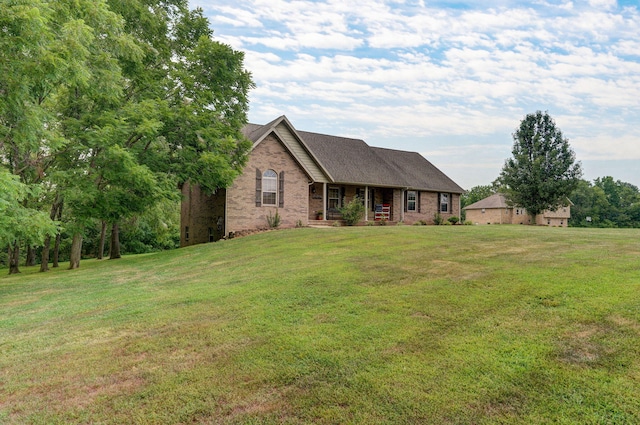 view of front of home with a front lawn