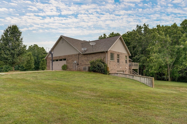 view of home's exterior with a yard