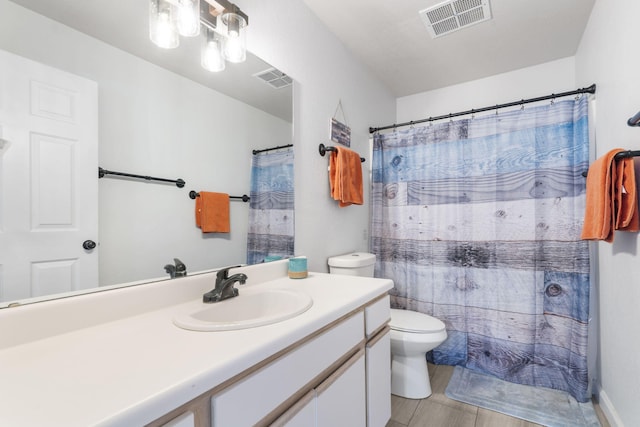 123 Bunker Ridge Dr Unit 7, Branson, MO 65616 - full bath with visible vents, vanity, and toilet
