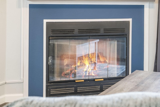 123 Bunker Ridge Dr Unit 7, Branson, MO 65616 - room details featuring a lit fireplace