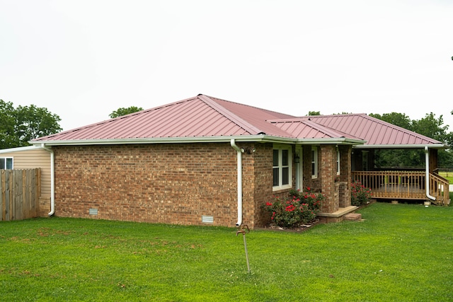 view of property exterior featuring a yard