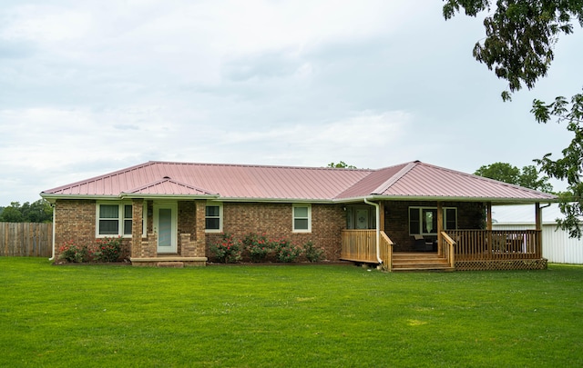 single story home featuring a front yard