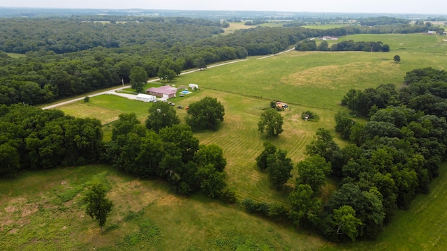 birds eye view of property featuring a rural view