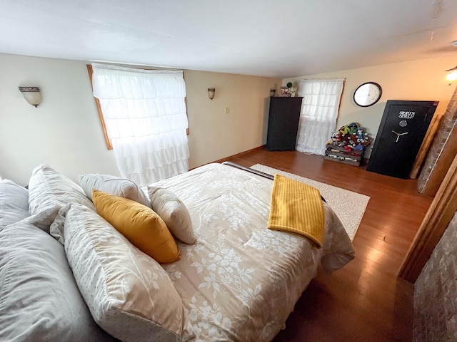 bedroom featuring wood-type flooring