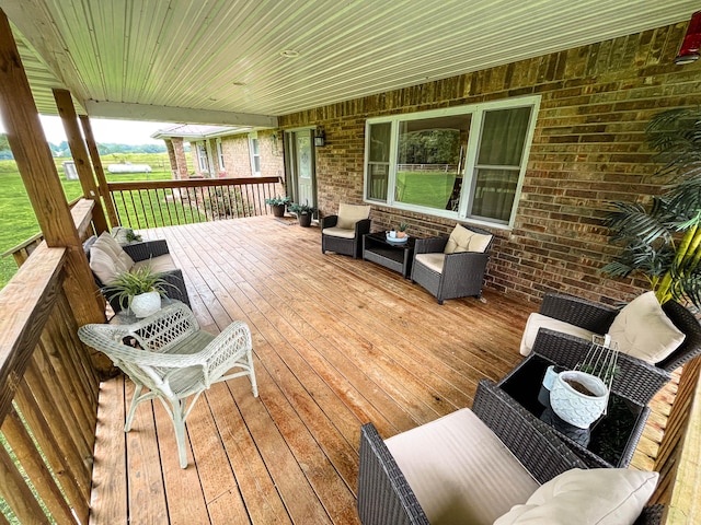 wooden terrace featuring an outdoor living space