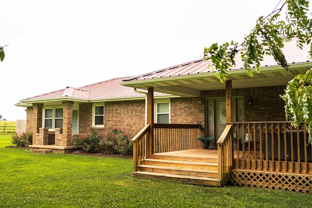 rear view of house with a lawn