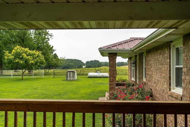 view of yard with a rural view