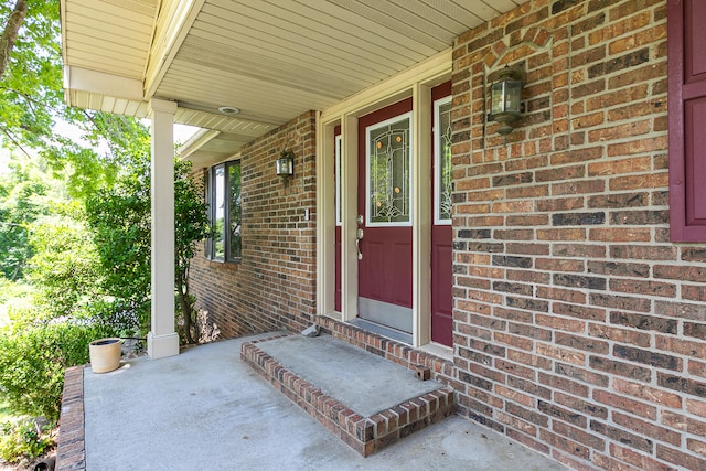 doorway to property with covered porch