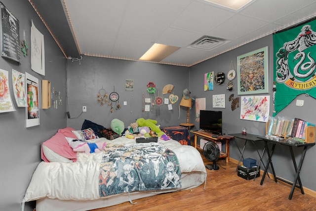 bedroom featuring wood-type flooring