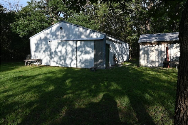 view of outdoor structure with a yard