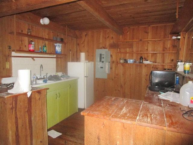 kitchen featuring open shelves, electric panel, beamed ceiling, wooden ceiling, and wood walls