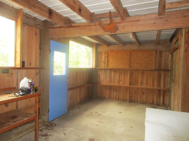 interior space featuring wood walls