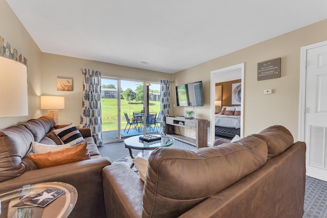 living area featuring visible vents