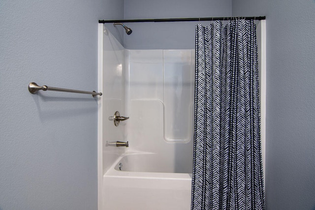 bathroom featuring shower / bath combo