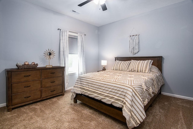 bedroom with ceiling fan and carpet