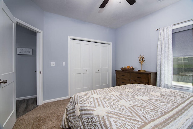 bedroom featuring ceiling fan, carpet floors, and a closet