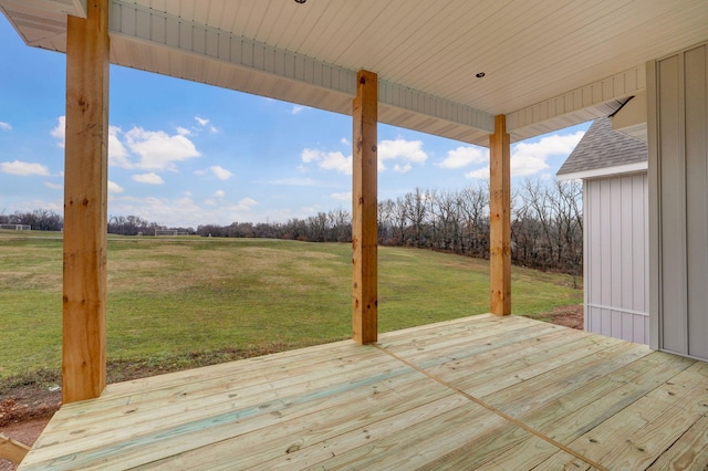 wooden deck with a yard