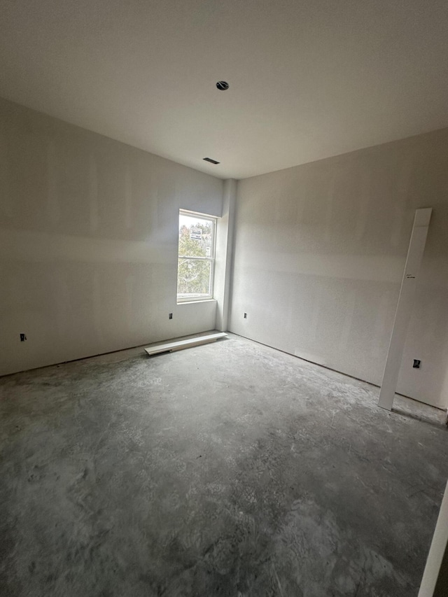 empty room featuring concrete floors