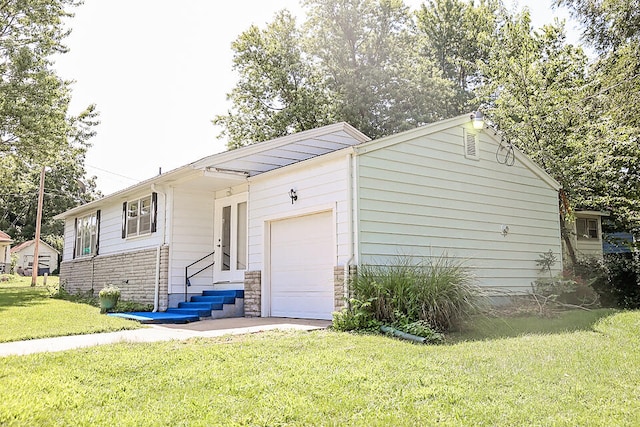 exterior space with a yard and a garage