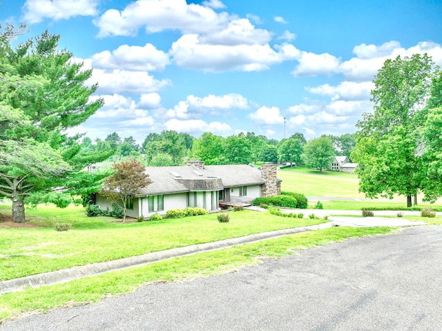 view of front of house with a front lawn