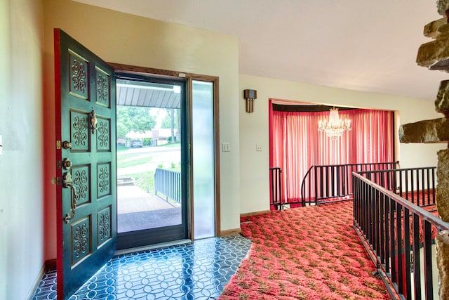 entryway featuring a notable chandelier