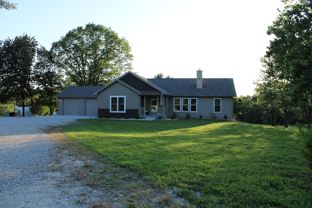 ranch-style home with a front lawn