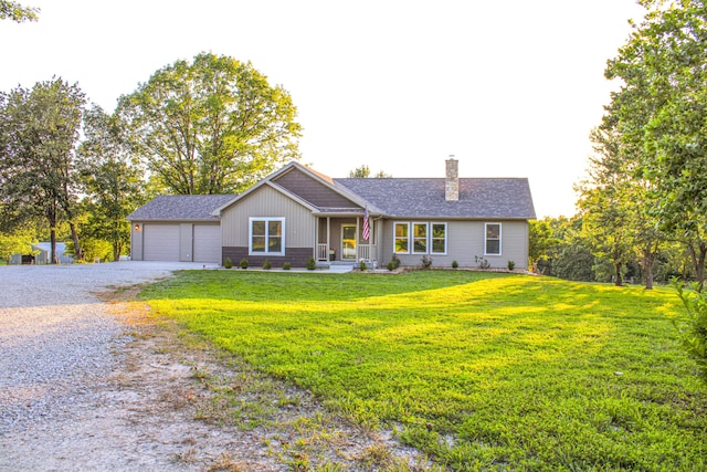 single story home with a front yard