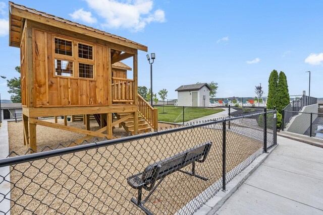 view of playground with fence