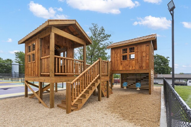 view of playground with fence