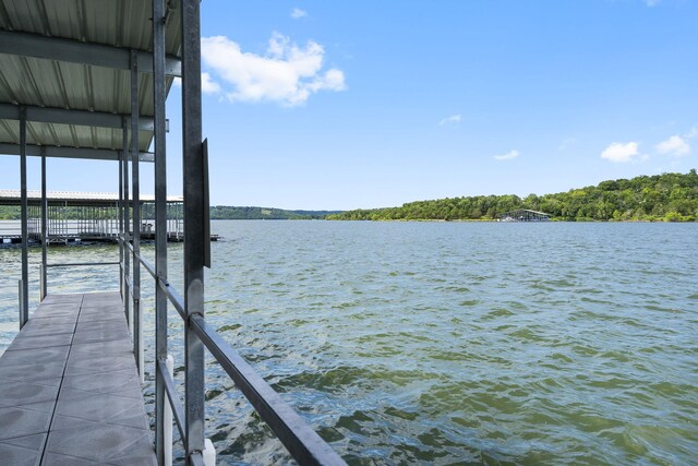 dock area featuring a water view