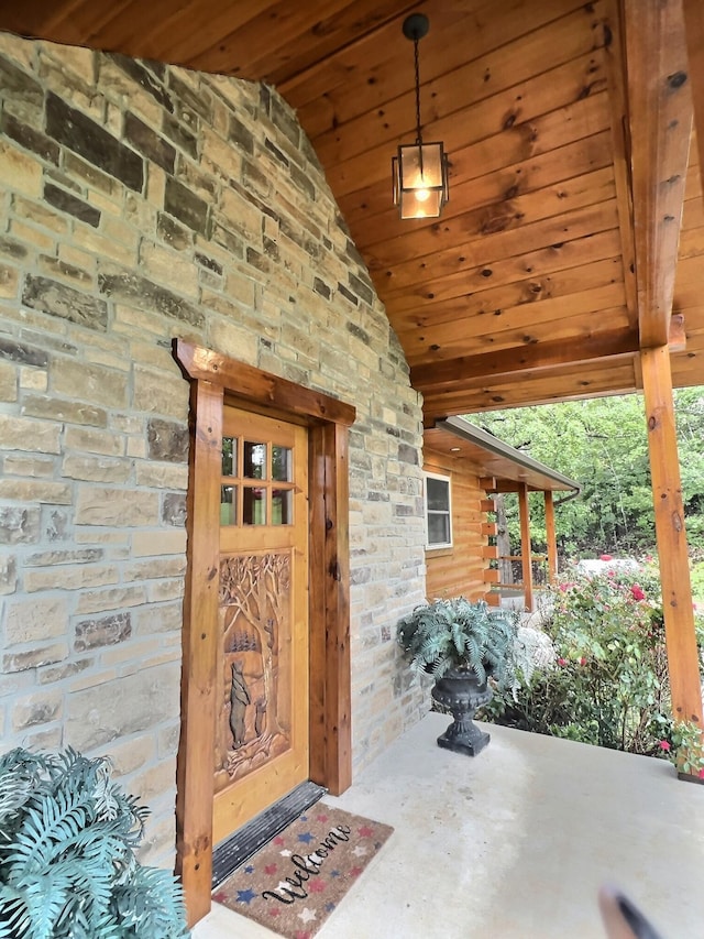 property entrance with covered porch